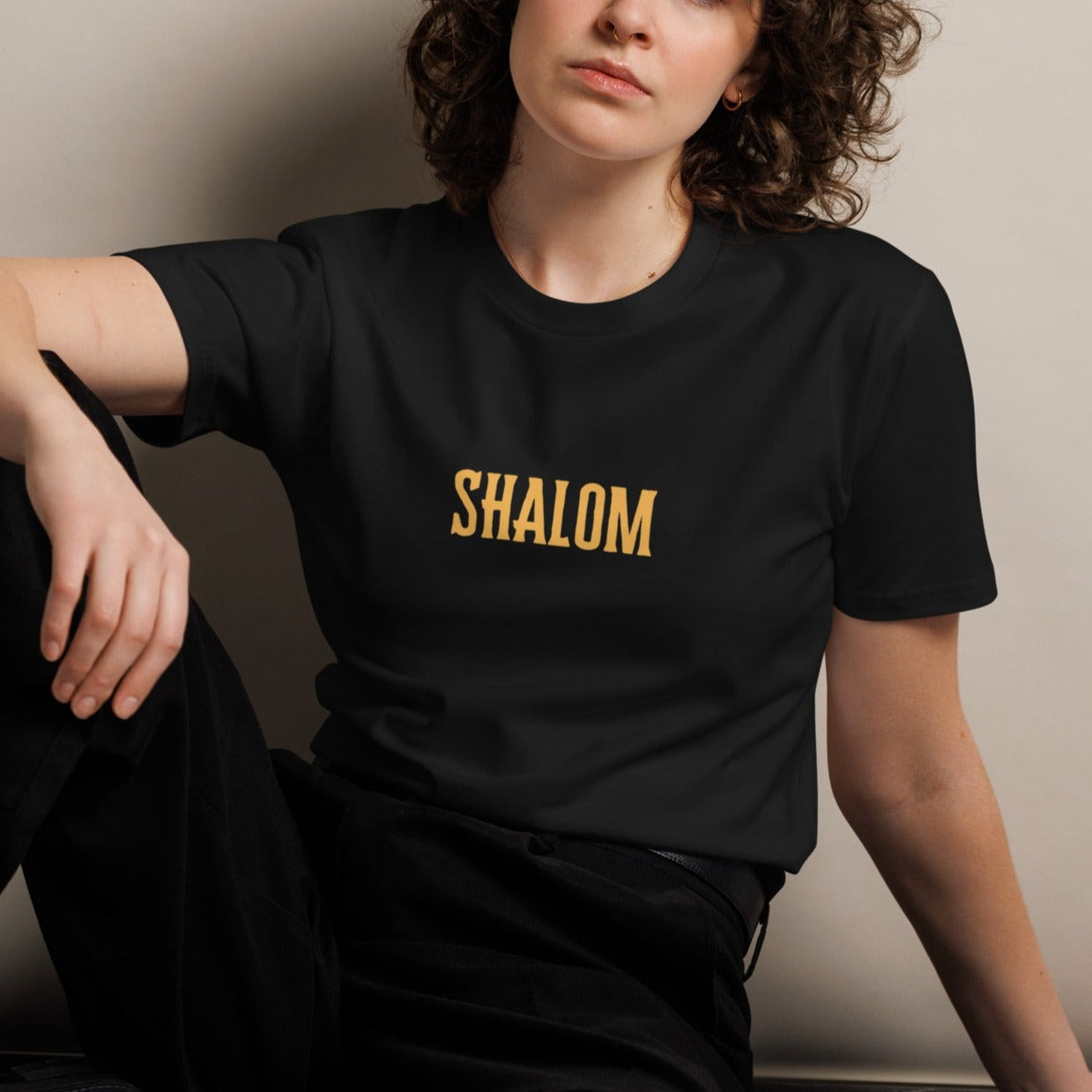 Peace Unisex T-shirt. "SHALOM" Choose from 5 colors with golden print.